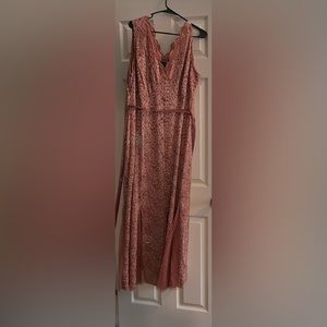 The dress has a good rosé undertone Under the beige overlay
